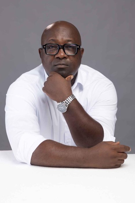 Frank Quarshie Djagbletey seated